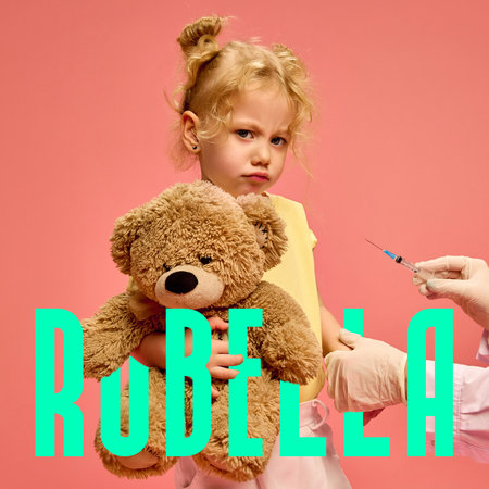 Little nervous girl holding teddy bear while receiving rubella vaccine. Conceptual design. Rubella...