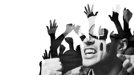 Fan in sunglasses supporting energetically favorite team with abstract hand silhouettes and painted...