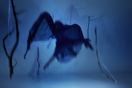 Phantom ballerina suspended in spectral glow, caught in ghostly like movement. Light and shadow blend elegance and mystiqueの写真素材