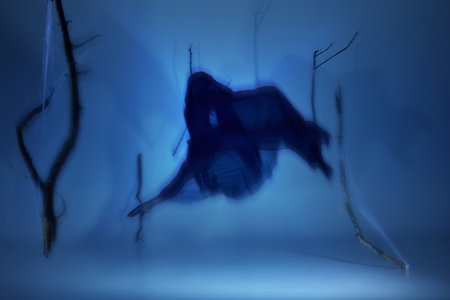 Ghostly ballerina in mid-air, her silhouette dissolving into dark foggy glow. Suspended in...