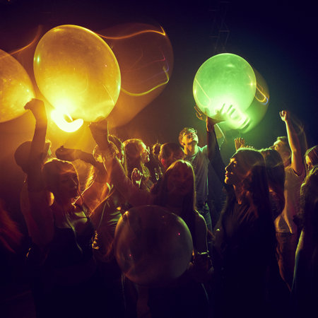 Young people, men and women gathering together, attending concert, party, cheerfully dancing and...
