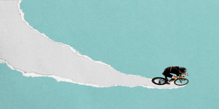 Male cyclist in aerodynamic position rides downward on curving torn paper stripe against light blue background. Textured scrap collage.の写真素材