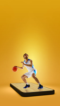 Live sports events from digital platform. Creative collage. Male basketball player dribbling on 3d phone-shaped court against yellow background. Cの写真素材