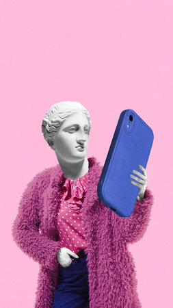 Modern artwork. Woman with classical sculpture face takes selfie with giant phone, while wearing fuzzy pink coat. Concept of self-expression, social mediaの写真素材