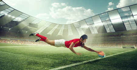 Female rugby player diving to score try on 3D stadium grass with determinationの写真素材