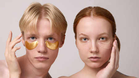 Couple skincare routine with golden and hydrogel under eye patchesの写真素材
