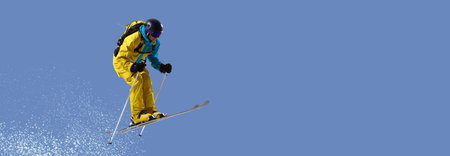 Skier performing jump with skis parallel in bright gear on snowy slope. Hand made collage. Banner