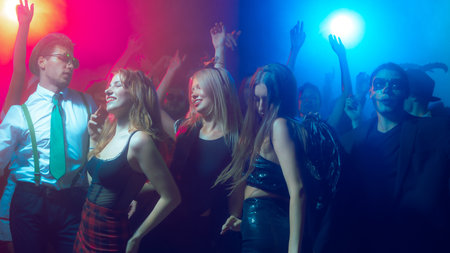 Woman in sparkling top enjoying music at festive party