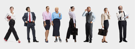 Composition of diverse group of business professionals posing with confidence on white background
