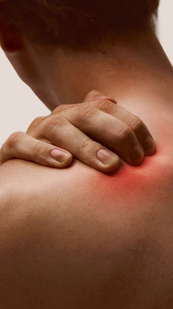 Man touching shoulder with visible muscle inflammation and pain. Digital artworkの写真素材