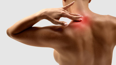 Woman touching shoulder with red inflamed pain area. Collage designの写真素材