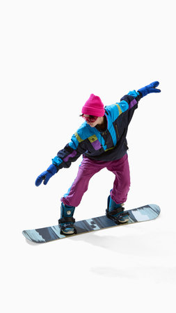 Snowboarder in retro outfit balancing with open arms isolated on white backgroundの写真素材