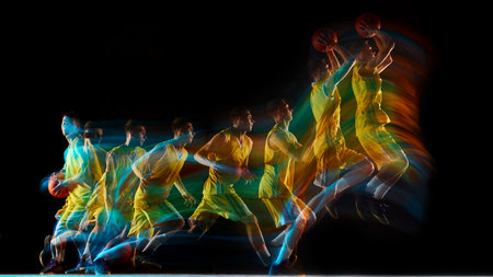 Basketball player sequence showing full jump motion with multicolor light streaksの写真素材
