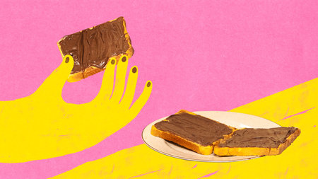 Minimalist pop art collage. Yellow hands holding chocolate spread toast on pink backgroundの写真素材