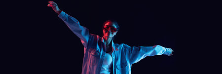 Woman smiling wearing oversized red glasses posing with confidence under neon glow.