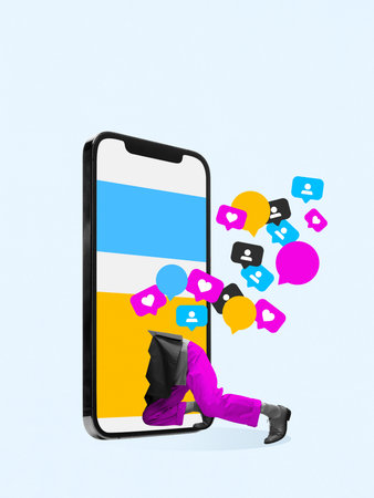 Playful poster of person crawling into giant smartphone while social icons float outward.の写真素材