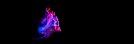 Basketball player flying upward with glowing ball and neon motion blur. Banner