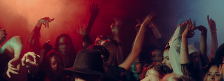 Raised hands at a New Year celebration.