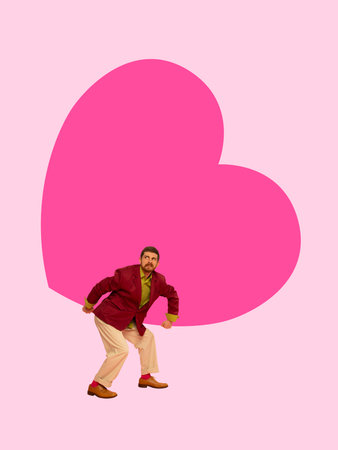 Expressive composition with man carrying oversized heart symbol.の写真素材