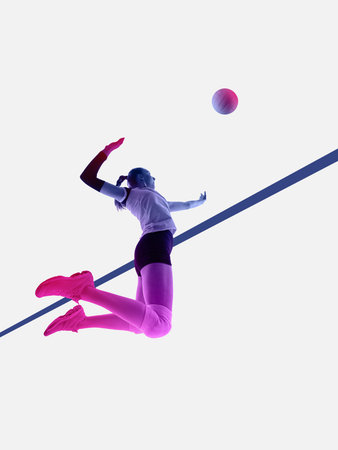 Dynamic artwork female volleyball player jumping for spike in duotone.の写真素材
