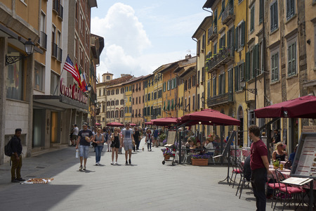 Pisa / Tuscany / Italy / May 2018 : sellers and waiters wait for the many tourists present in the cityのeditorial素材
