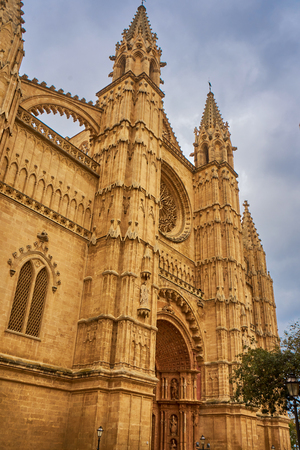 The Catedral-BasÃ­lica de Santa MarÃ­a de Mallorca in Palma On A Cloudy Dayのeditorial素材