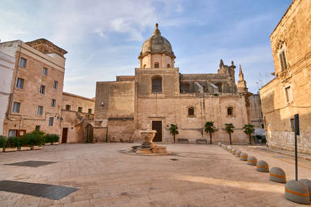 Small Square and Fountain in Front of Saint Teresa's Church - Chiesa di Santa Teresa at Sunset - Monopoli - Apulia - Puglia - Italyのeditorial素材