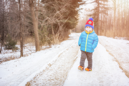 Children standing at the snowのeditorial素材