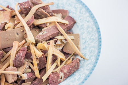 Close up to plate of animal\'s internal organsの写真素材