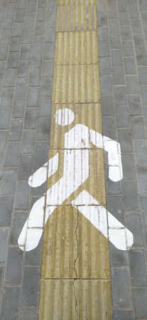 Road for pedestrians and bicycles drawn on the asphalt. Lanes for cyclists and pedestrians. Traffic...