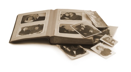 old family photo album with old photosの写真素材
