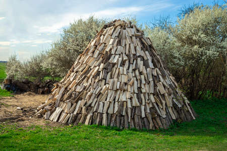 Big beautifl firewood pile in rustic environment in the village