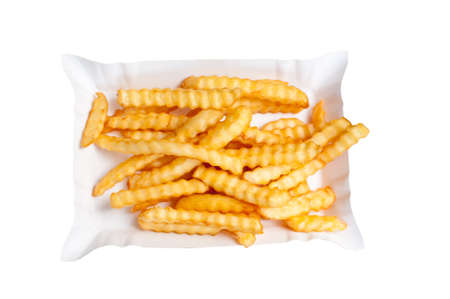 ribbed yellow french fries in white cardboard plate isolated on white background