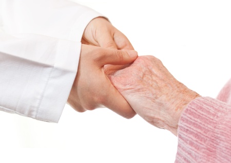 Doctor Holding Senior's Handsの写真素材