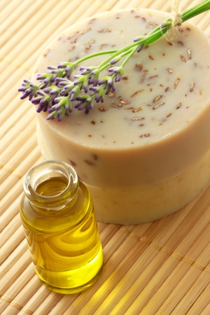 Essential oil and bars of handmade soapの写真素材