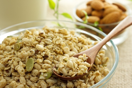Whole grain cereal with milk and almondの写真素材
