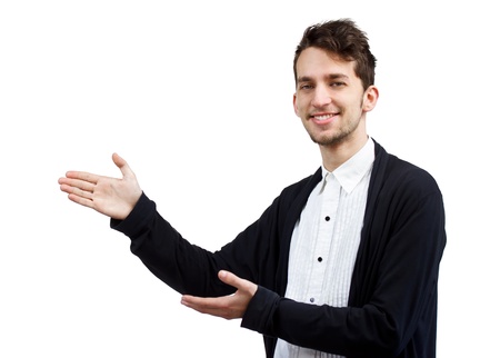 Successful Smiling Young Man Presenting over White Backgroundの写真素材