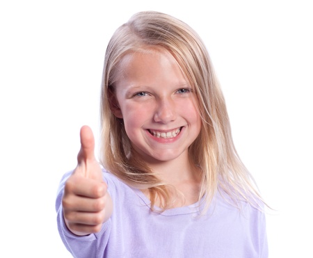 Happy Young Girl Giving Thumbs up - Isolated on Whiteの写真素材