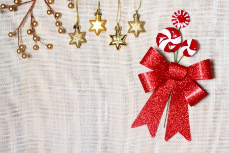 Christmas Burlap Backdrop with Bow and Candyの写真素材
