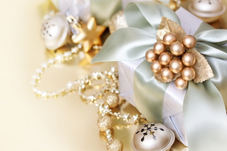 Christmas gift box with bells and starsの写真素材