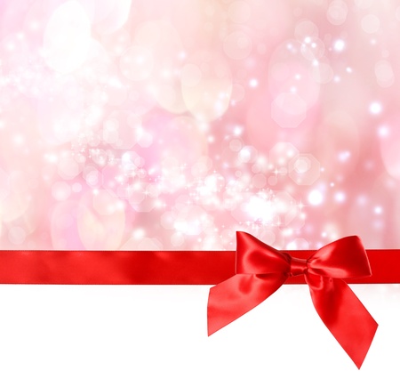 Red Bow and Ribbon with Bokeh Lights Background の写真素材