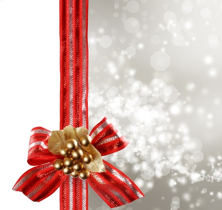 Red Bow and Ribbon with Sliver Bokeh Lights Background の写真素材