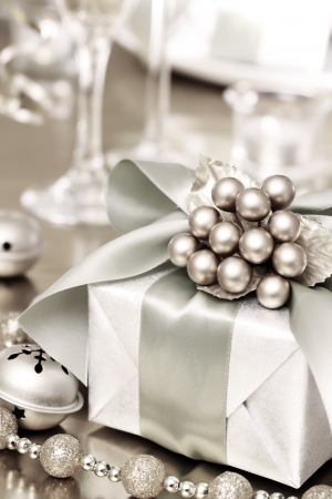 Christmas Gift Box on the Dinner Tableの写真素材