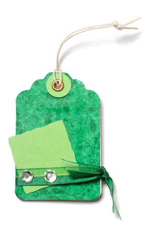 Green Price Tag with Ribbon and Decoration on White Background - Handmadeの写真素材