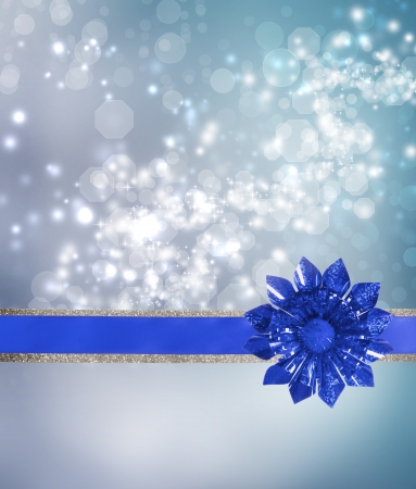 Blue Bow and Ribbon with Blue Lights Background の写真素材