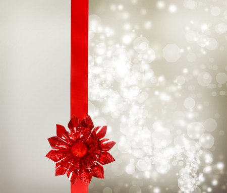 Red Bow and Ribbon with Silver Lights Background の写真素材