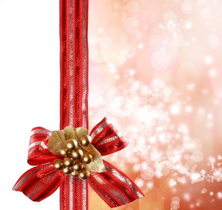 Red Bow and Ribbon with Bokeh Lights Background の写真素材