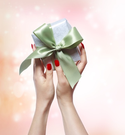 Woman Holding a Small Gift Boxの写真素材