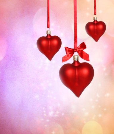 Valentine heart ornaments with pink grunge backgroundの写真素材