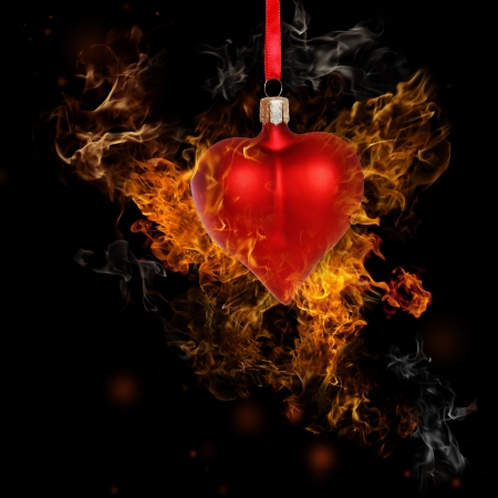 Fire Heart Bauble on Black Backgroundの写真素材